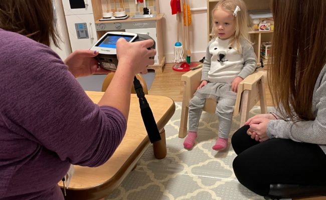 A two-year-old attending a hearing/vision screening with CIS/Early Intervention in Bennington, Vermont